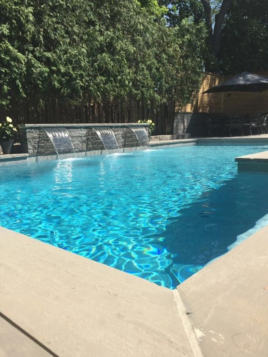 Affordable custom in-ground swimming pool by G3 Pool and Spa